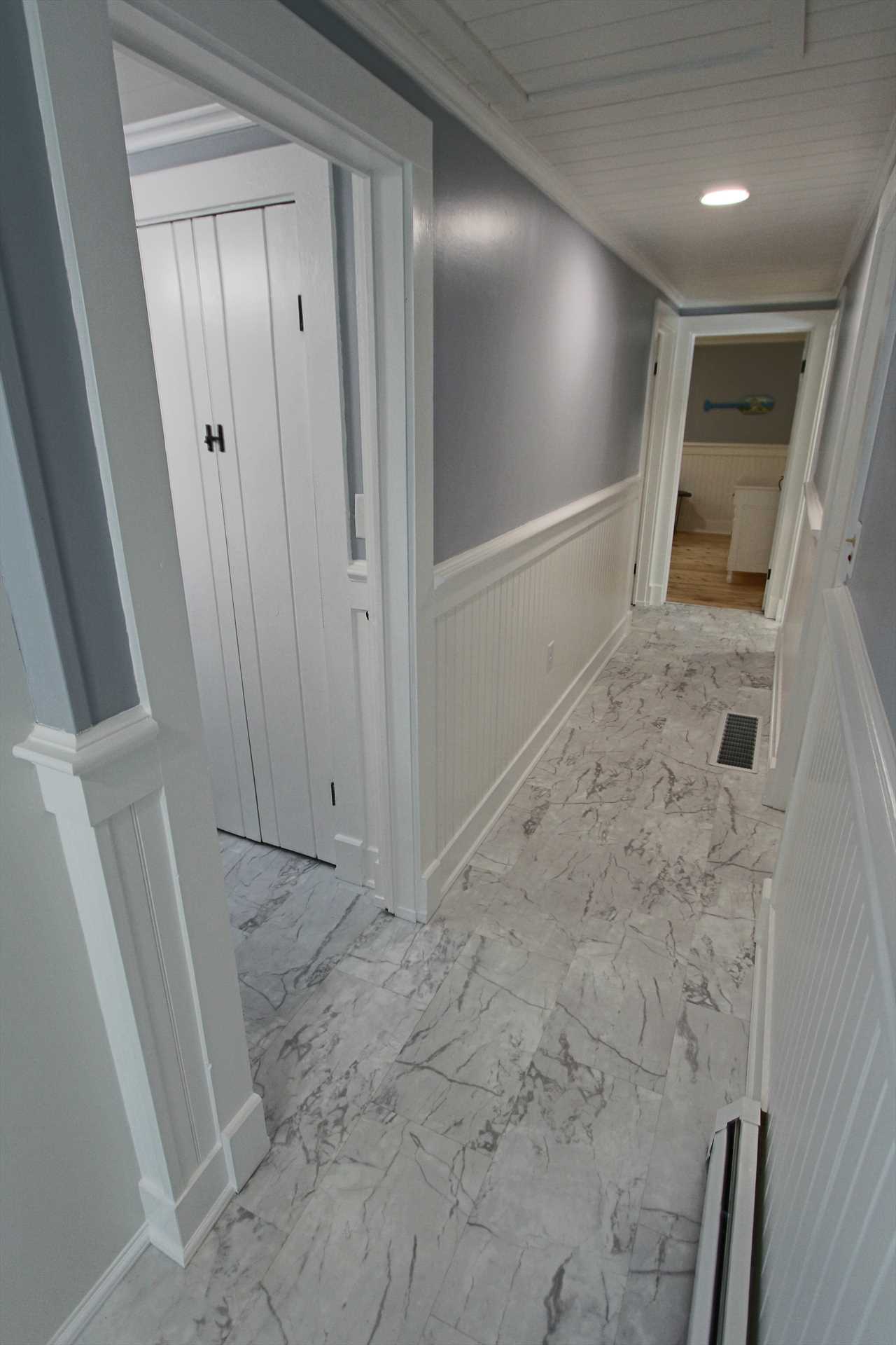 Hallway from Kitchen to Shared Main Bath and Bedrooms