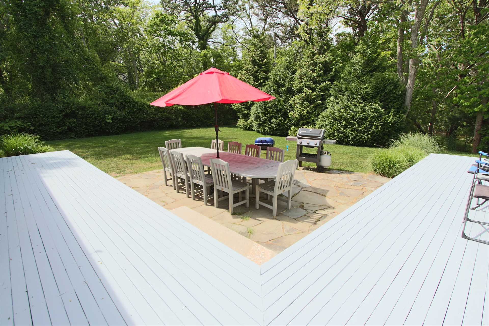 Deck out back with Patio area with Table and chairs