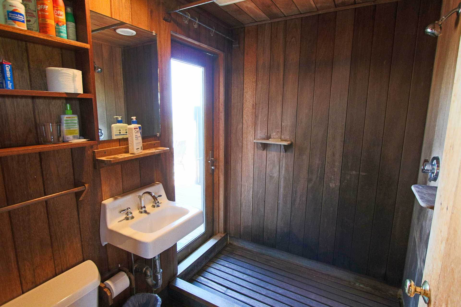 Bathroom with Shower. Door in Bathroom Leads out to deck are