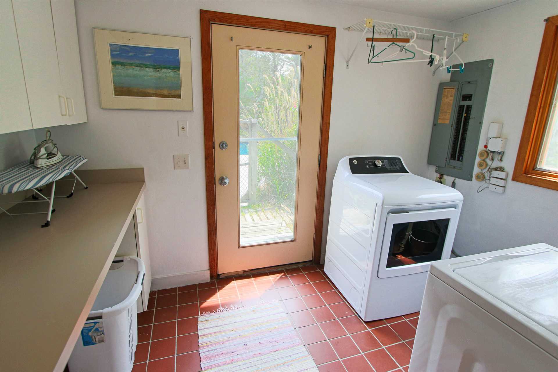 Laundry Room, out to Pool area and Outdoor Shower